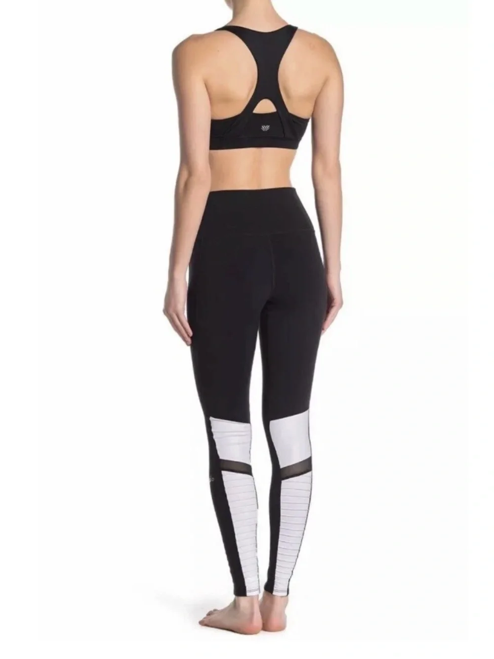ALO Yoga Moto Leggings in a black and white